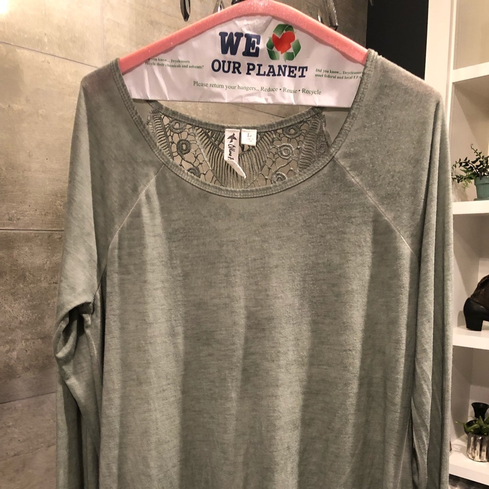 Super soft and flowing split back top